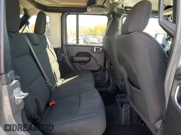 2022 Jeep Wrangler Unlimited High Tide z VIN 1C4HJXDG3NW165125, wystawiony jako Copart lot #76404964 z przebiegiem 31 061 mil mil oraz Szkoda całkowita • Salvage title. Historia ofert i sprzedaży dostępna na DreamBid. Obrazek 11.