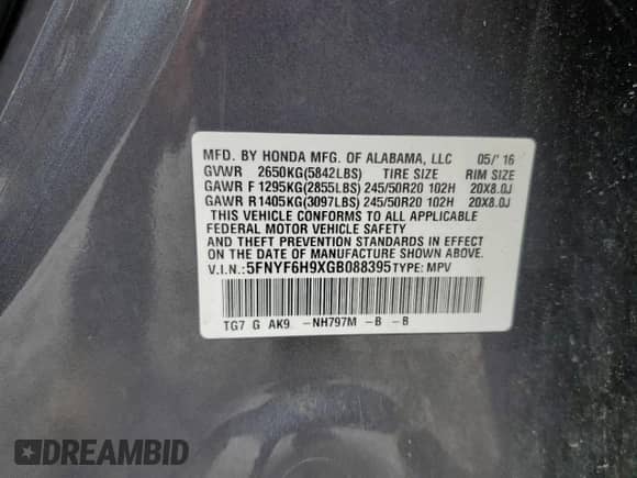 2016 Honda Pilot Touring с VIN 5FNYF6H9XGB088395, выставлен на аукционе Copart как лот 69828005 с пробегом Не указан миль и Списание • Salvage title. История ставок и продаж доступна на DreamBid. Изображение 13.