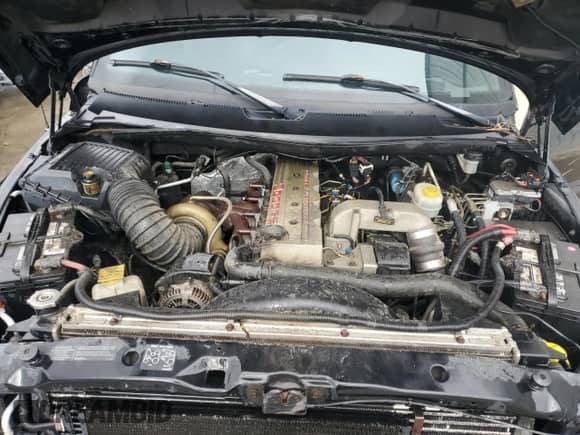 1999 Dodge 3500 with VIN 1B7MC3361XJ624548, listed as a Copart auction lot 77225594 with 193,623 mi miles and Salvage title. Bid and sale history available at DreamBid. Image 11.