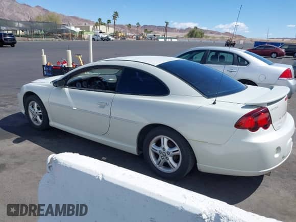 2003 Dodge Stratus SE z VIN 4B3AG42G93E196528, wystawiony jako IAAI lot #41941304 z przebiegiem 191 930 mil mil oraz . Historia ofert i sprzedaży dostępna na DreamBid. Obrazek 3.