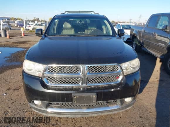 2013 Dodge Durango Crew with VIN 1C4RDJDG0DC674145, listed as a IAAI auction lot 43489425 with 129,527 mi miles and . Bid and sale history available at DreamBid. Image 12.