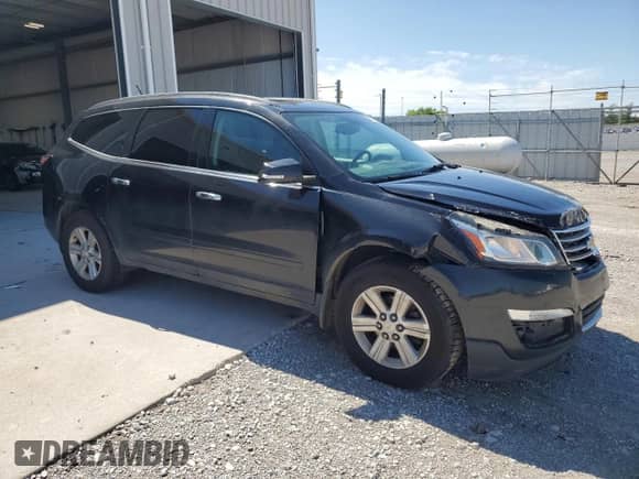 2014 Chevrolet Traverse LT с VIN 1GNKVHKD1EJ168621, выставлен на аукционе Copart как лот 63517115 с пробегом 106 159 миль миль и Списание • Salvage title. История ставок и продаж доступна на DreamBid. Изображение 4.