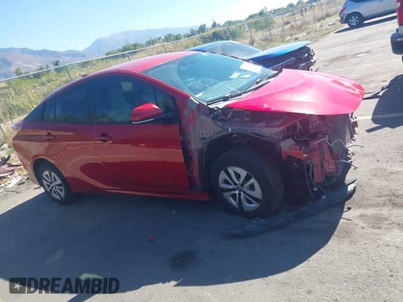 2016 Toyota Prius Three z VIN JTDKARFU1G3526019, wystawiony jako IAAI lot #43351310 z przebiegiem 100 375 mil mil oraz . Historia ofert i sprzedaży dostępna na DreamBid. Obrazek 13.