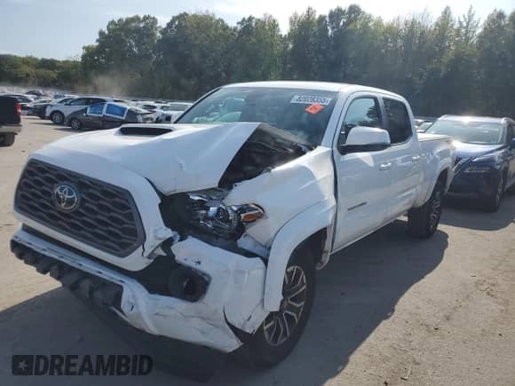 2023 Toyota Tacoma SR5 с VIN 3TMDZ5BN6PM147282, выставлен на аукционе Copart как лот 82028355 с пробегом 51 704 миль миль и Списание • Salvage title. История ставок и продаж доступна на DreamBid. Изображение 1.