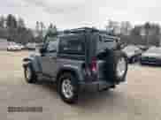 2013 Jeep Wrangler Sport with VIN 1C4AJWAG7DL605881, listed as a IAAI auction lot 41980930 with 214,662 mi miles and . Bid and sale history available at DreamBid. Image 3.