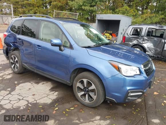 2018 Subaru Forester Premium z VIN JF2SJAEC6JH426553, wystawiony jako IAAI lot #43420868 z przebiegiem 43 531 mil mil oraz . Historia ofert i sprzedaży dostępna na DreamBid. Obrazek 1.
