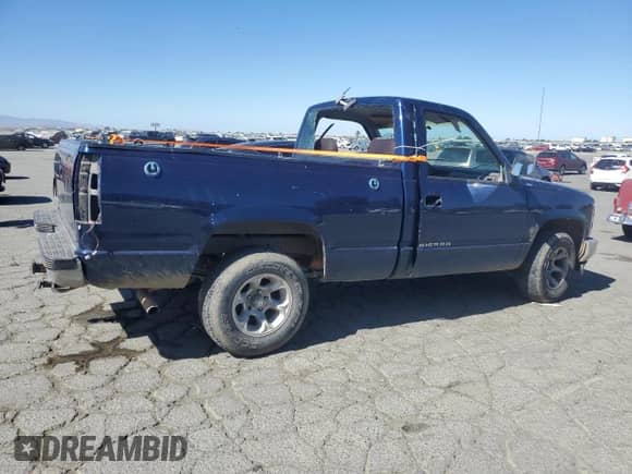 1994 GMC Sierra 1500 with VIN 1GTDC14Z8RZ554211, listed as a Copart auction lot 58243655 with 163,522 mi miles and Salvage title. Bid and sale history available at DreamBid. Image 3.