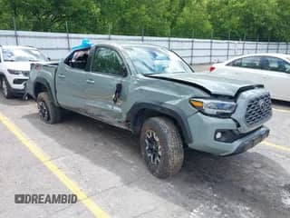 2023 Toyota Tacoma SR z VIN 3TMCZ5AN5PM541627, wystawiony jako IAAI lot #42320498 z przebiegiem Nie podano mil oraz . Historia ofert i sprzedaży dostępna na DreamBid. Obrazek 1.