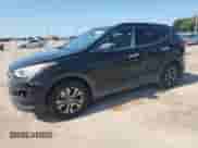 2014 Hyundai Santa Fe с VIN 5XYZU3LB3EG208207, выставлен на аукционе Copart как лот 61654435 с пробегом 175 702 миль миль и Списание • Salvage title. История ставок и продаж доступна на DreamBid. Изображение 1.