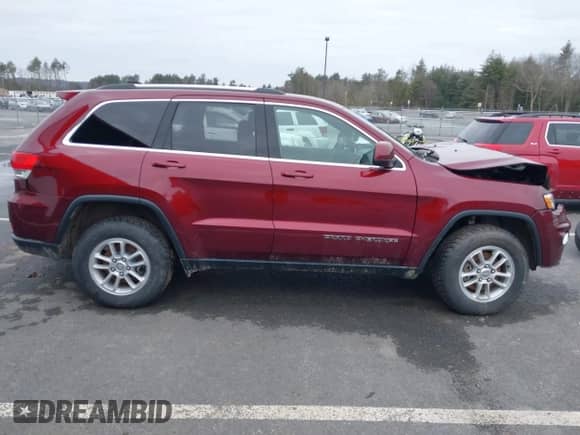 2019 Jeep Grand Cherokee Laredo E with VIN 1C4RJFAG2KC814154, listed as a IAAI auction lot 38877814 with 54,119 mi miles and . Bid and sale history available at DreamBid. Image 14.