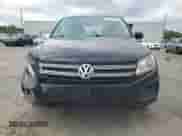 2013 Volkswagen Tiguan SE z VIN WVGAV3AX9DW600422, wystawiony jako Copart lot #64600645 z przebiegiem 134 869 mil mil oraz Czysty tytuł • Clean title. Historia ofert i sprzedaży dostępna na DreamBid. Obrazek 5.