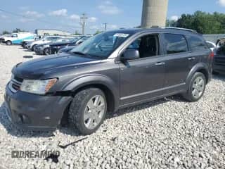 2014 Dodge Journey Limited with VIN 3C4PDDDG9ET174631, listed as a Copart auction lot 64568735 with 137,541 mi miles and Clean title. Bid and sale history available at DreamBid. Image 1.