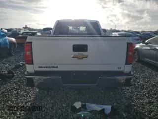 2018 Chevrolet Silverado 1500 LT z VIN 1GCRCREC5JZ181910, wystawiony jako Copart lot #85835015 z przebiegiem 81 394 mil mil oraz Szkoda całkowita • Salvage title. Historia ofert i sprzedaży dostępna na DreamBid. Obrazek 6.