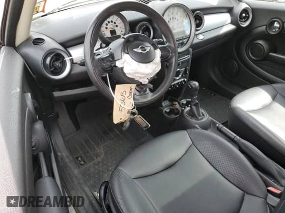 2013 MINI Hardtop with VIN WMWSU3C58DT685565, listed as a Copart auction lot 70710745 with 87,237 mi miles and Salvage title. Bid and sale history available at DreamBid. Image 8.