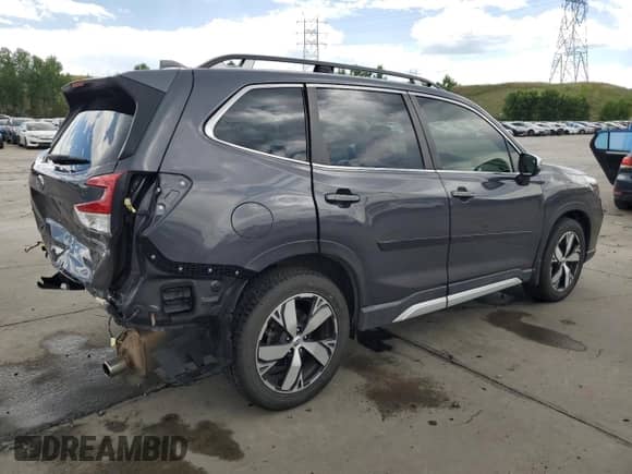 2020 Subaru Forester Touring with VIN JF2SKAXC9LH553617, listed as a Copart auction lot 62558155 with 55,366 mi miles and Salvage title. Bid and sale history available at DreamBid. Image 3.