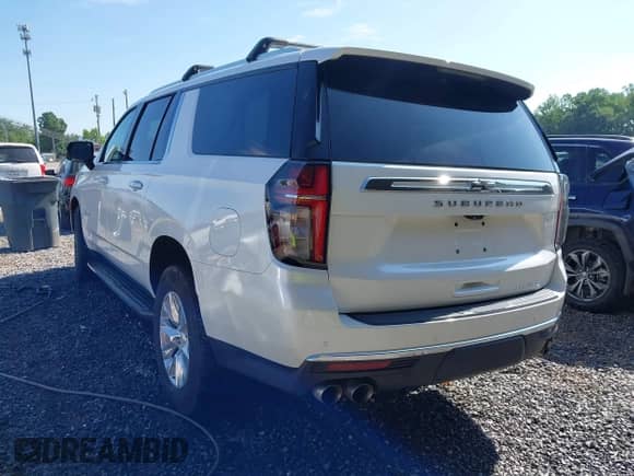 2021 Chevrolet Suburban Premier z VIN 1GNSKFKD5MR232530, wystawiony jako IAAI lot #42554269 z przebiegiem 92 365 mil mil oraz . Historia ofert i sprzedaży dostępna na DreamBid. Obrazek 3.