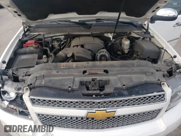 2013 Chevrolet Tahoe LTZ with VIN 1GNSKCE03DR379274, listed as a Copart auction lot 85088675 with 183,968 mi miles and Salvage title. Bid and sale history available at DreamBid. Image 12.