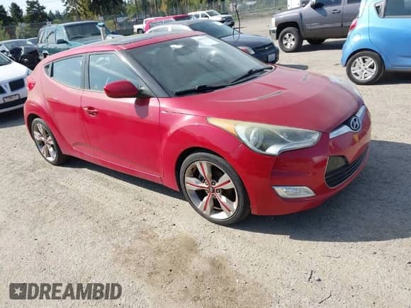 2012 Hyundai Veloster w/Black Int с VIN KMHTC6AD4CU077164, выставлен на аукционе IAAI как лот 42053970 с пробегом 122 657 миль миль и . История ставок и продаж доступна на DreamBid. Изображение 1.