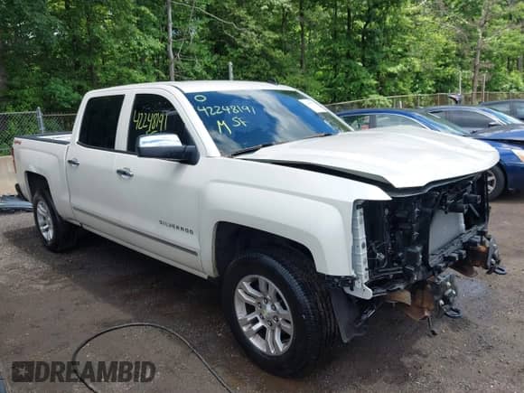 2014 Chevrolet Silverado 1500 LTZ with VIN 3GCUKSEC3EG312519, listed as a IAAI auction lot 42248191 with 141,707 mi miles and . Bid and sale history available at DreamBid. Image 1.
