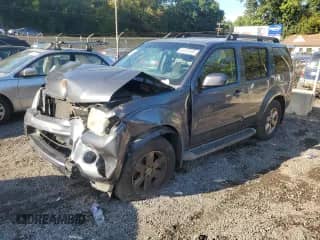 2012 Nissan Pathfinder SV with VIN 5N1AR1NB2CC637934, listed as a Copart auction lot 81475785 with 220,392 mi miles and Salvage title. Bid and sale history available at DreamBid. Image 1.