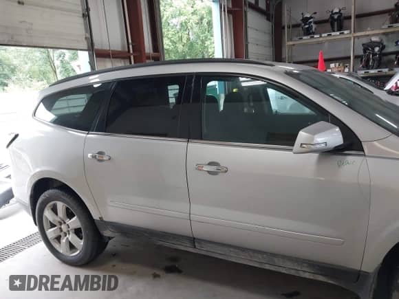 2016 Chevrolet Traverse LT with VIN 1GNKVGKD9GJ161073, listed as a IAAI auction lot 43025978 with 143,832 mi miles and . Bid and sale history available at DreamBid. Image 13.