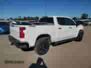 2023 Chevrolet Silverado 1500 LT Trail Boss z VIN 3GCUDFED8PG285668, wystawiony jako Copart lot #85270945 z przebiegiem 43 851 mil mil oraz Szkoda całkowita • Salvage title. Historia ofert i sprzedaży dostępna na DreamBid. Obrazek 3.