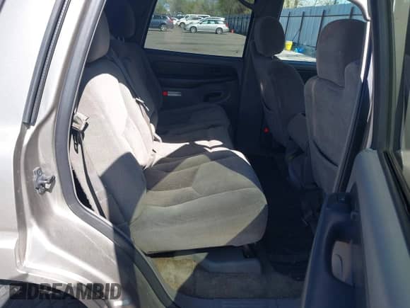 2003 Chevrolet Tahoe LT z VIN 1GNEK13Z53J305628, wystawiony jako IAAI lot #42032538 z przebiegiem Nie podano mil oraz . Historia ofert i sprzedaży dostępna na DreamBid. Obrazek 8.