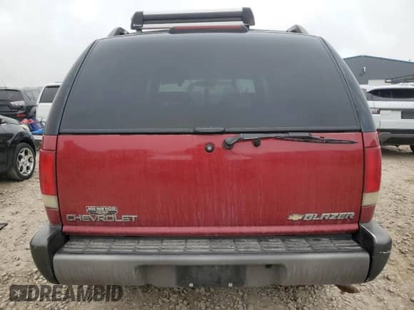 1995 Chevrolet Blazer z VIN 1GNDT13W2S2236856, wystawiony jako Copart lot #47813165 z przebiegiem 862 143 mil mil oraz Szkoda całkowita • Salvage title. Historia ofert i sprzedaży dostępna na DreamBid. Obrazek 6.