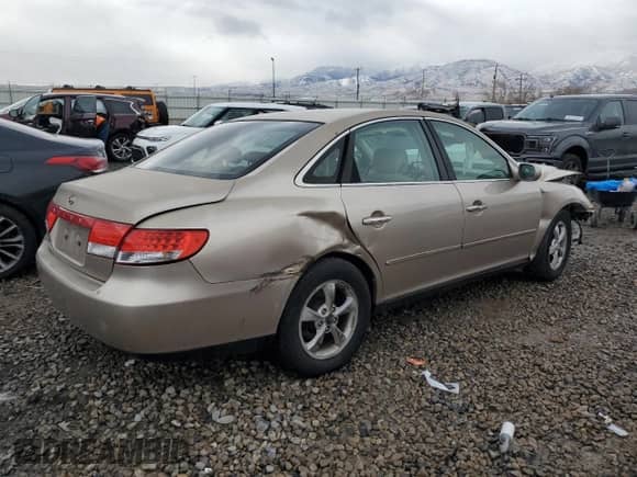 2006 Hyundai Azera SE с VIN KMHFC46F06A079897, выставлен на аукционе Copart как лот 45366915 с пробегом Не указан миль и Списание • Salvage title. История ставок и продаж доступна на DreamBid. Изображение 3.