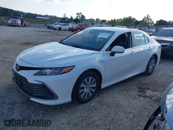 2021 Toyota Camry Hybrid LE with VIN 4T1C31AK7MU554477, listed as a IAAI auction lot 43395450 with 139,747 mi miles and . Bid and sale history available at DreamBid. Image 17.