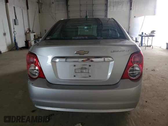 2012 Chevrolet Sonic LT с VIN 1G1JD5SH0C4160507, выставлен на аукционе Copart как лот 49842145 с пробегом 134 777 миль миль и Чистый • Clean title. История ставок и продаж доступна на DreamBid. Изображение 6.