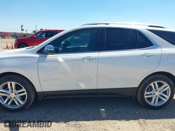 2018 Chevrolet Equinox Premier with VIN 2GNAXVEVXJ6104478, listed as a IAAI auction lot 43056014 with 82,627 mi miles and . Bid and sale history available at DreamBid. Image 14.