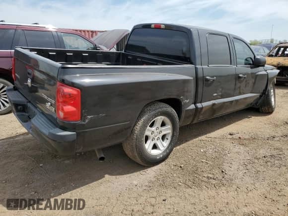 2010 Dodge Dakota Bighorn/Lonestar z VIN 1D7CE3GK9AS212902, wystawiony jako Copart lot #56234345 z przebiegiem 269 043 mil mil oraz Szkoda całkowita • Salvage title. Historia ofert i sprzedaży dostępna na DreamBid. Obrazek 3.