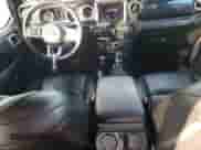 2021 Jeep Wrangler Unlimited Sahara High Altitude with VIN 1C4HJXEG0MW671105, listed as a Copart auction lot 74175244 with 51,610 mi miles and Salvage title. Bid and sale history available at DreamBid. Image 8.