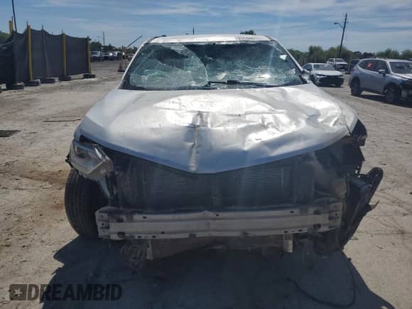 2018 Chevrolet Traverse LT Cloth с VIN 1GNEVGKW6JJ148223, выставлен на аукционе Copart как лот 70534615 с пробегом Не указан миль и Списание • Salvage title. История ставок и продаж доступна на DreamBid. Изображение 5.