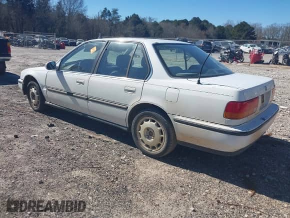 1992 Honda Accord LX z VIN JHMCB7659NC048944, wystawiony jako IAAI lot #41704471 z przebiegiem 253 535 mil mil oraz . Historia ofert i sprzedaży dostępna na DreamBid. Obrazek 3.