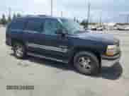 2002 Chevrolet Tahoe LS with VIN 1GNEC13T52R290024, listed as a Copart auction lot 65583635 with 154,333 mi miles and Salvage title. Bid and sale history available at DreamBid. Image 4.