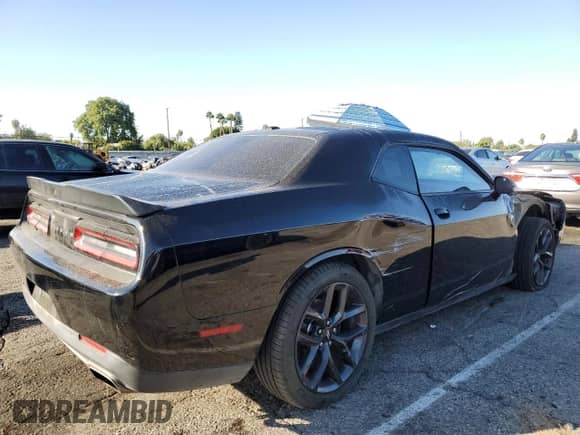 2019 Dodge Challenger SXT с VIN 2C3CDZAG5KH501261, выставлен на аукционе Copart как лот 82255865 с пробегом 119 269 миль миль и Списание • Salvage title. История ставок и продаж доступна на DreamBid. Изображение 3.