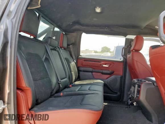 2020 Ram 1500 Rebel z VIN 1C6SRFLT2LN199221, wystawiony jako Copart lot #68965755 z przebiegiem 49 714 mil mil oraz Szkoda całkowita • Salvage title. Historia ofert i sprzedaży dostępna na DreamBid. Obrazek 10.