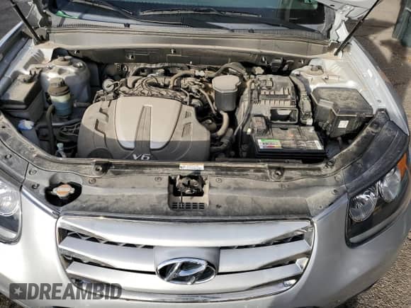 2012 Hyundai Santa Fe Limited с VIN 5XYZKDAG6CG120677, выставлен на аукционе Copart как лот 89695045 с пробегом Не указан миль и Списание • Salvage title. История ставок и продаж доступна на DreamBid. Изображение 11.