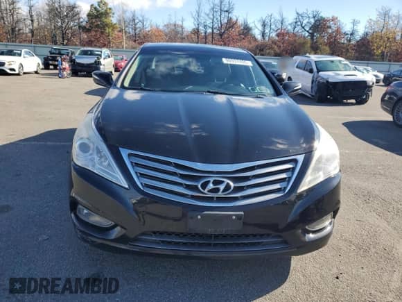 2013 Hyundai Azera z VIN KMHFH4JG9DA221002, wystawiony jako Copart lot #90937405 z przebiegiem 164 253 mil mil oraz Czysty tytuł • Clean title. Historia ofert i sprzedaży dostępna na DreamBid. Obrazek 5.