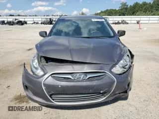 2014 Hyundai Accent GLS z VIN KMHCT4AE8EU704156, wystawiony jako Copart lot #81121835 z przebiegiem 149 131 mil mil oraz Szkoda całkowita • Salvage title. Historia ofert i sprzedaży dostępna na DreamBid. Obrazek 5.