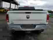 2014 Ram 1500 Laramie z VIN 1C6RR7NM4ES430439, wystawiony jako Copart lot #58587125 z przebiegiem Nie podano mil oraz Szkoda całkowita • Salvage title. Historia ofert i sprzedaży dostępna na DreamBid. Obrazek 6.