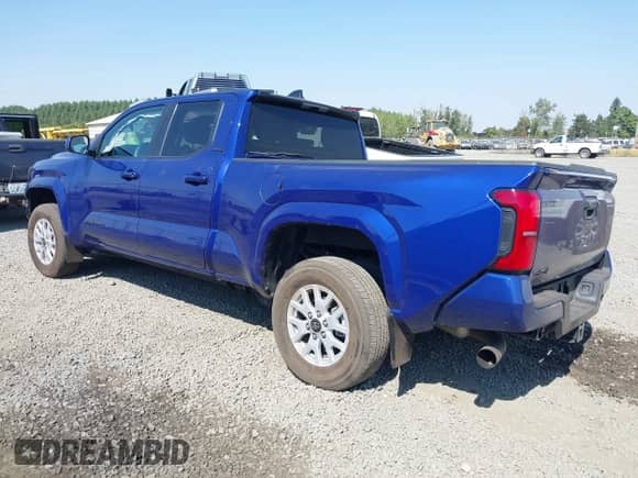 2024 Toyota Tacoma TRD Off Road with VIN 3TMLB5JN7RM001123, listed as a IAAI auction lot 43085472 with 35,813 mi miles and . Bid and sale history available at DreamBid. Image 3.