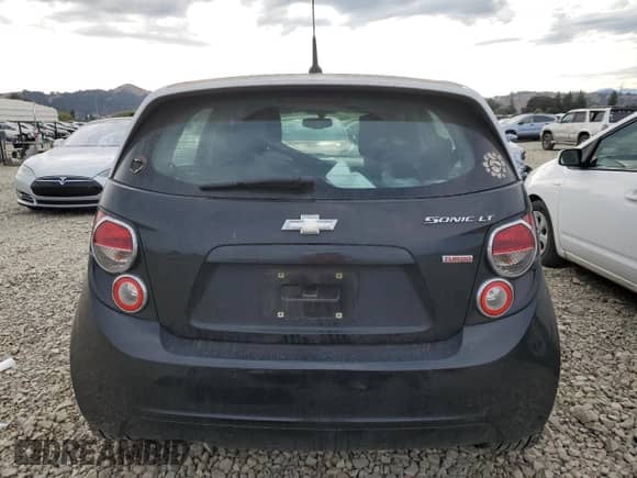 2014 Chevrolet Sonic LT с VIN 1G1JC6SB5E4143080, выставлен на аукционе Copart как лот 80531665 с пробегом 131 246 миль миль и Списание • Salvage title. История ставок и продаж доступна на DreamBid. Изображение 6.