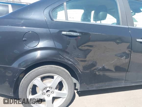 2013 Chevrolet Sonic LTZ with VIN 1G1JE5SG4D4121828, listed as a IAAI auction lot 42203119 with 110,226 mi miles and . Bid and sale history available at DreamBid. Image 6.