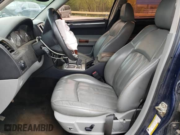 2006 Chrysler 300 C with VIN 2C3KA63H66H240561, listed as a Copart auction lot 71257935 with 188,941 mi miles and Salvage title. Bid and sale history available at DreamBid. Image 7.