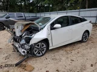 2016 Toyota Prius Three Touring z VIN JTDKARFU0G3016986, wystawiony jako Copart lot #83934555 z przebiegiem Nie podano mil oraz Szkoda całkowita • Salvage title. Historia ofert i sprzedaży dostępna na DreamBid. Obrazek 1.