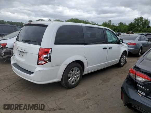 2019 Dodge Grand Caravan SE 35th Anniversary Edition with VIN 2C4RDGBG1KR801799, listed as a Copart auction lot 57633535 with 141,550 mi miles and Salvage title. Bid and sale history available at DreamBid. Image 3.