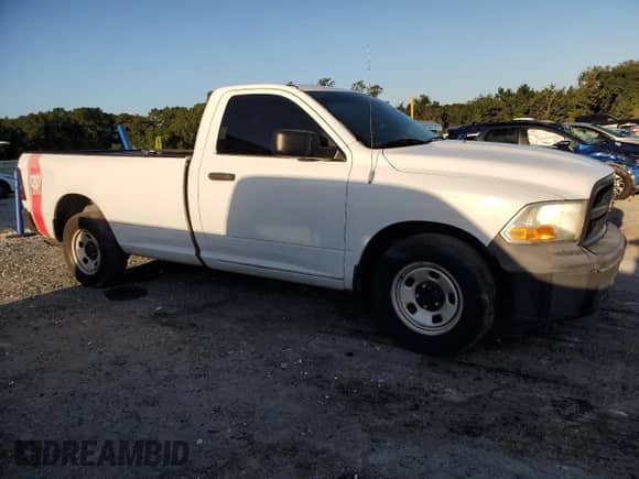 2012 Ram 1500 ST with VIN 3C6JD6DKXCG169134, listed as a Copart auction lot 71307445 with 233,927 mi miles and Clean title. Bid and sale history available at DreamBid. Image 4.